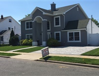 Two story home with dormer